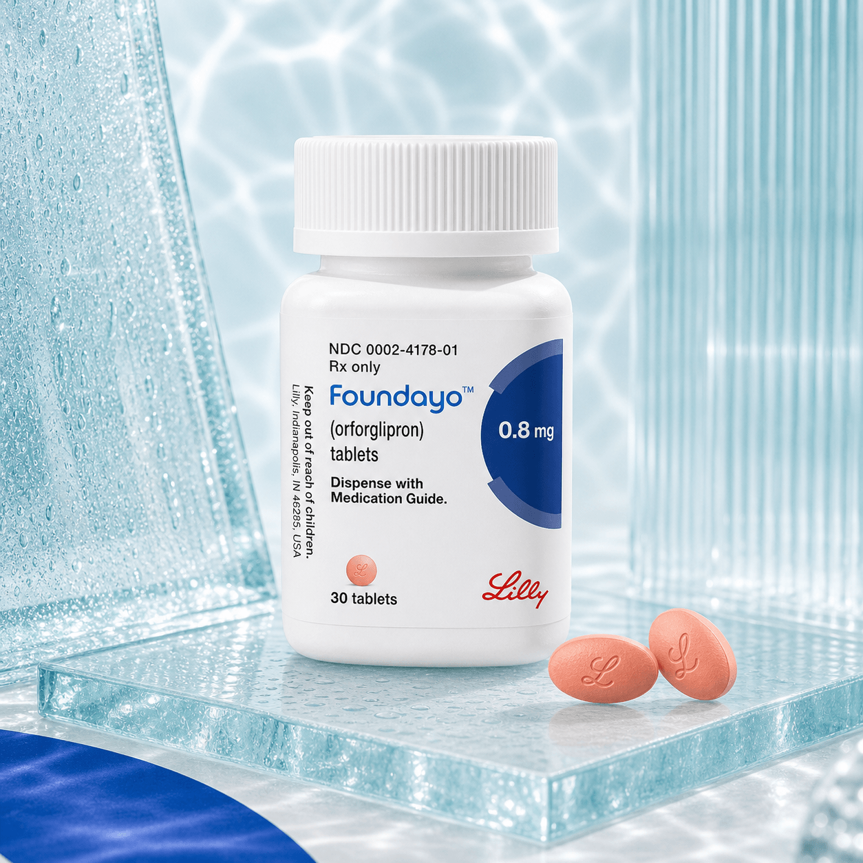 Foundayo Tablets prescription bottle with peach oval oral tablets.